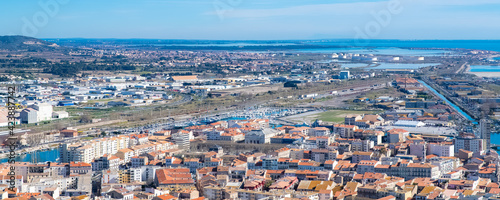Sète in France, aerial panorama, the harbor and the city with typical tiles roofs 