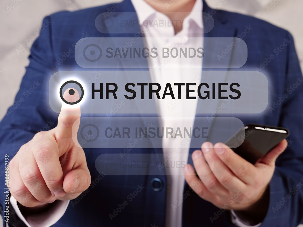 HR STRATEGIES human resources phrase on the screen. Marketing expert use cell technologies at office. A Human Resource strategy is a business's overall plan for managing its human capital HR STRATEGIES human resources phrase on the screen. Marketing expert use cell technologies at office. A Human Resource strategy is a business's overall plan for managing its human capital