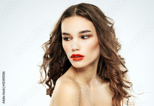 romantic woman with beautiful hairstyle and makeup red lips