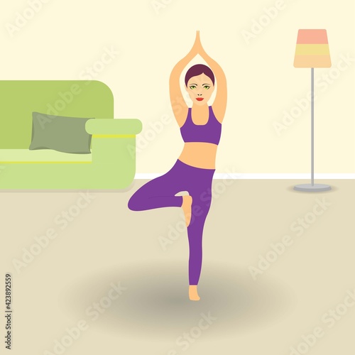 Young woman indoors practicing yoga