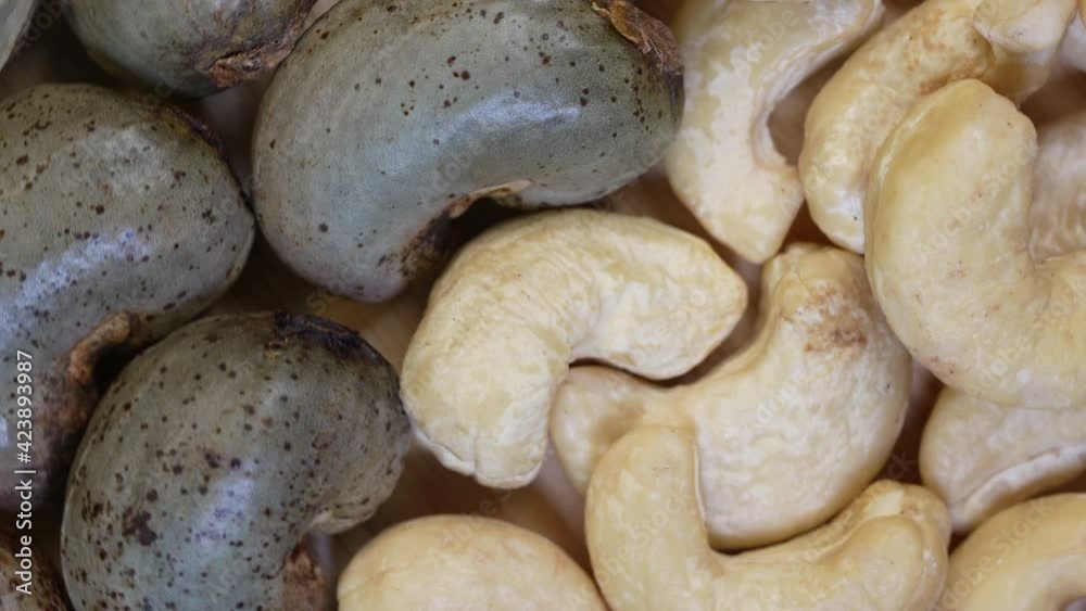 Top view Rotate Fresh cashew nut on wooden Background, 4K Top view Rotate Fresh cashew nut on wooden Background, 4K