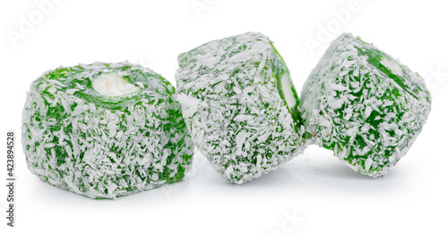 Close up of green Turkish delight sweets isolated on white
