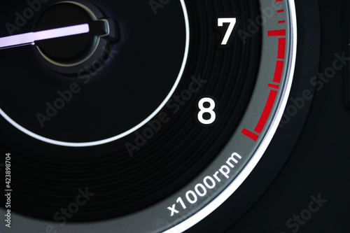 Red zone on vehicle tachometer photo