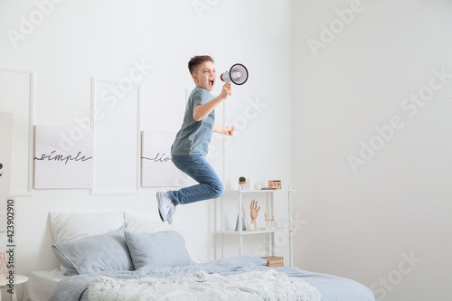 Screaming little boy with m...