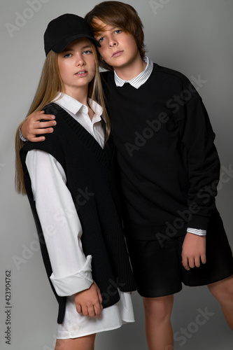 Children style and fashion. Beautiful kids teens in the studio. High quality photo.