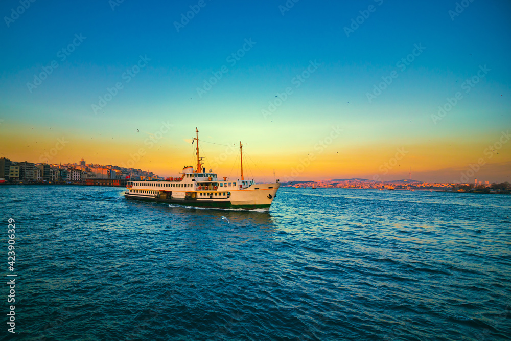 Ferry and Cityscape of Istanbul at sunset