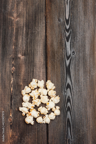 popcorn on a wooden table enjoyment rest meal