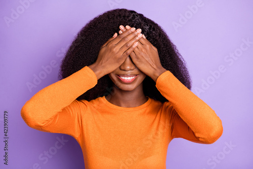 Canvas Print Portrait of pretty funny cheerful wavy-haired girl closing eyes guess who isolat