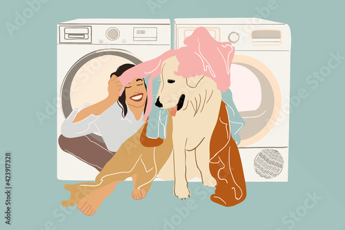 A smiling woman playing with dog and colored clothes near washing and drying machine. Housewife doing routine. Flat style. Vector illustration