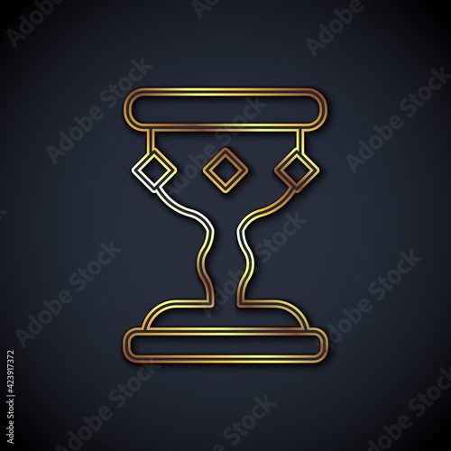 Gold line Medieval goblet icon isolated on black background. Vector