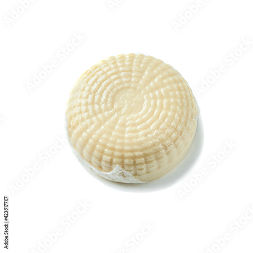 Suluguni is an original cheese. Vacuum packed. View from above. White background. Isolated.