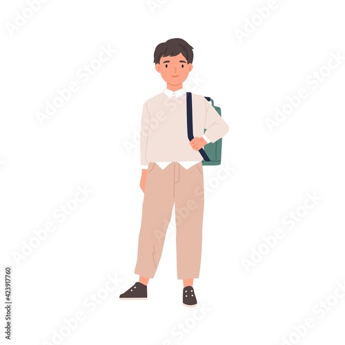 Portrait of happy smiling schoolboy with schoolbag. School boy standing in sn...