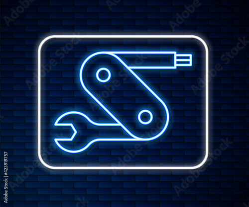 Glowing neon line Swiss army knife icon isolated on brick wall background. Multi-tool, multipurpose penknife. Multifunctional tool. Vector