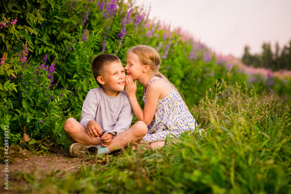 happy children in light clothes on the path in the park, a summer concept and a happy free childhood happy children in light clothes on the path in the park, a summer concept and a happy free childhood