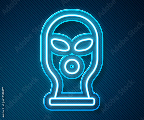 Glowing neon line Balaclava icon isolated on blue background. A piece of clothing for winter sports or a mask for a criminal or a thief. Vector