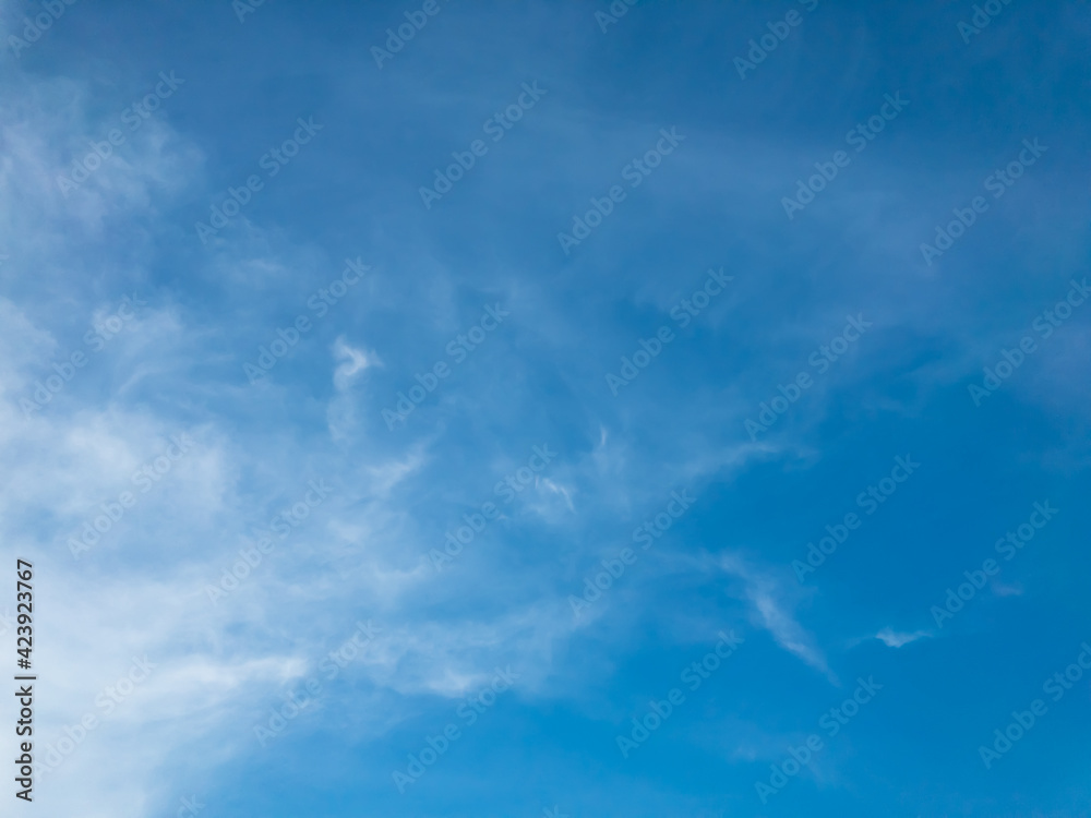 blue sky background with soft white clouds,copy space.