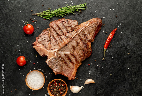 Grilled T-Bone Beef Steak on a stone background