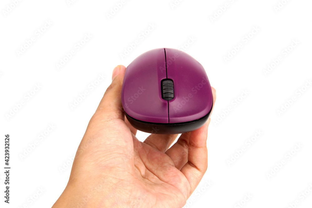 A hand holding a wireless computer mouse isolated on white background A hand holding a wireless computer mouse isolated on white background