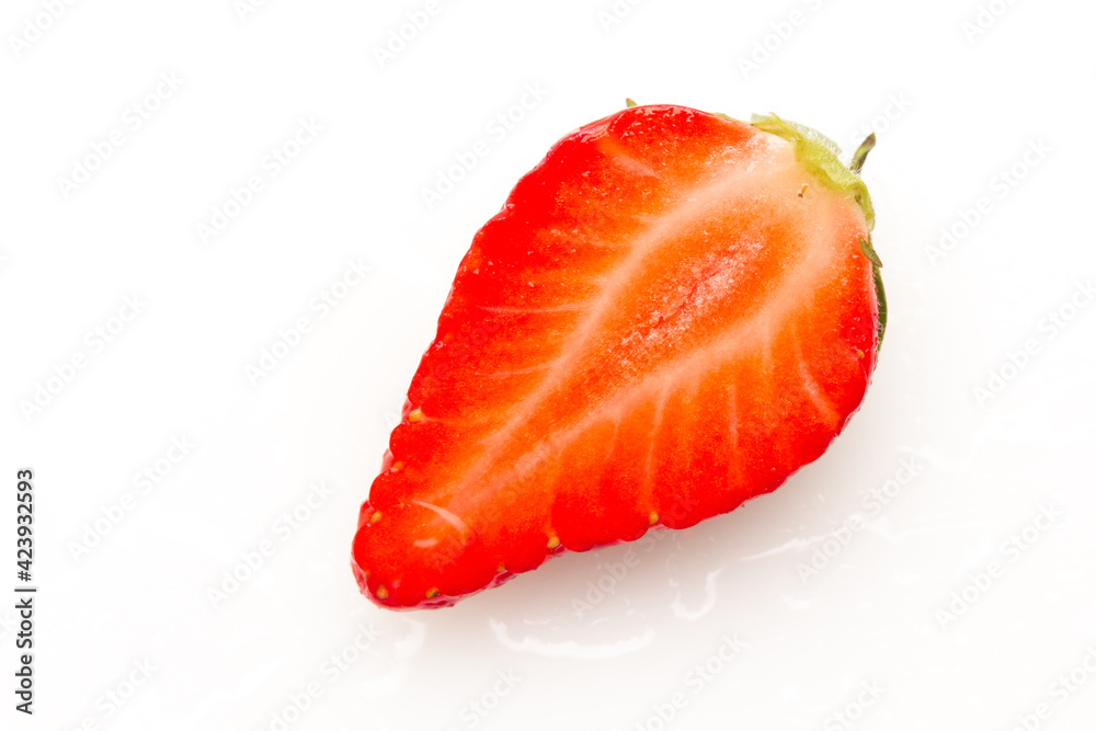 Two strawberries close up on white background Two strawberries close up on white background