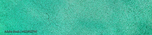 Rubber floor texture background. EPDM playground surface. Green cracked background. photo