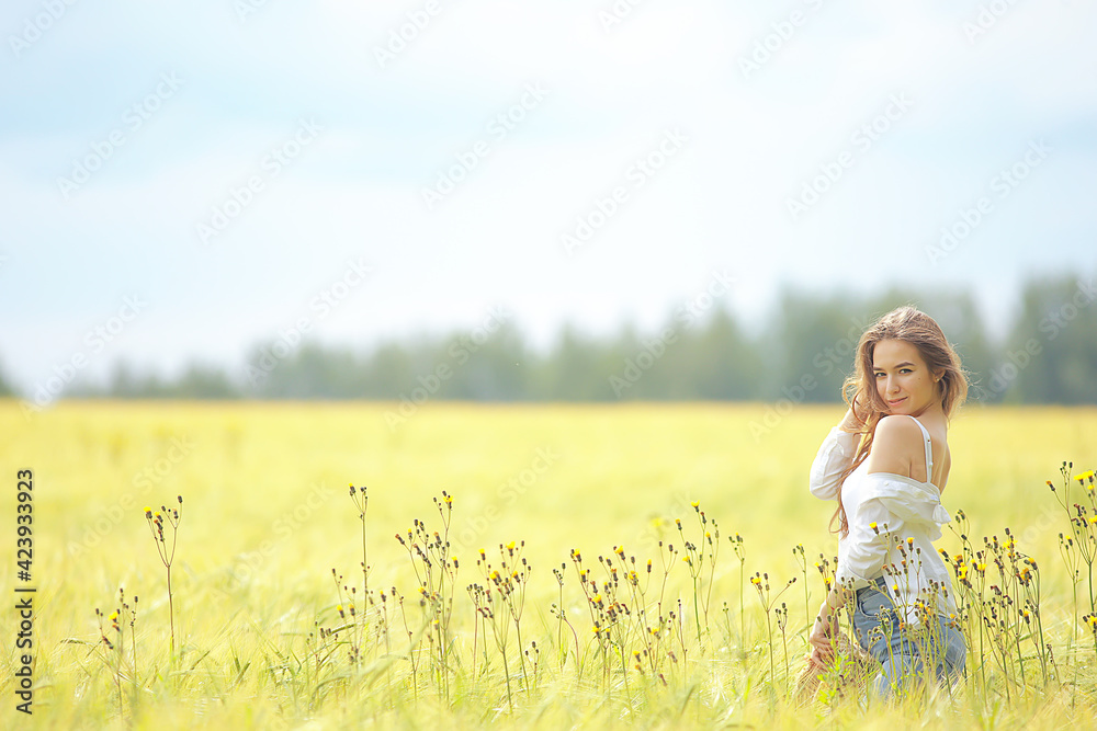 anonymous girl field view from the back / happiness freedom joyful girl mood summer vacation anonymous girl field view from the back / happiness freedom joyful girl mood summer vacation