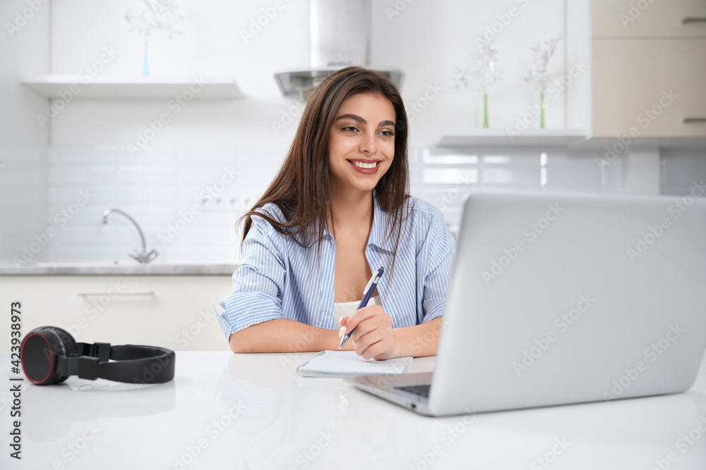 Beautiful brunette woman working in laptop. Beautiful brunette woman working in laptop.