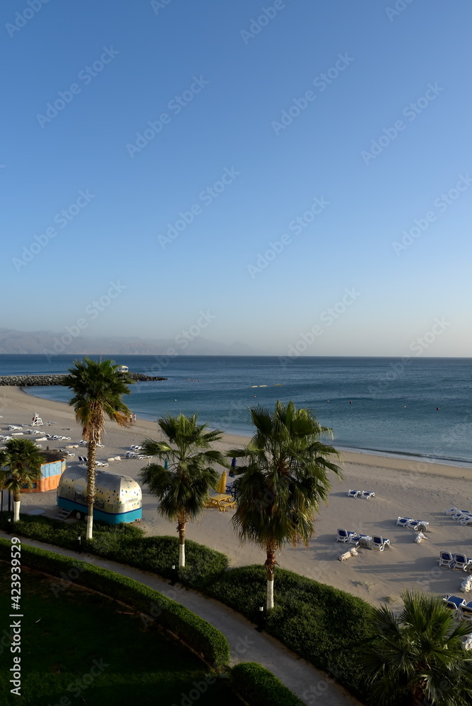 Obraz premium Radisson Blu Beach resort, Dibba, Al Fujairah, United Arab Emirates March 21, 2021, view of beach and sea (Gulf of Oman) at the beach resort hotel