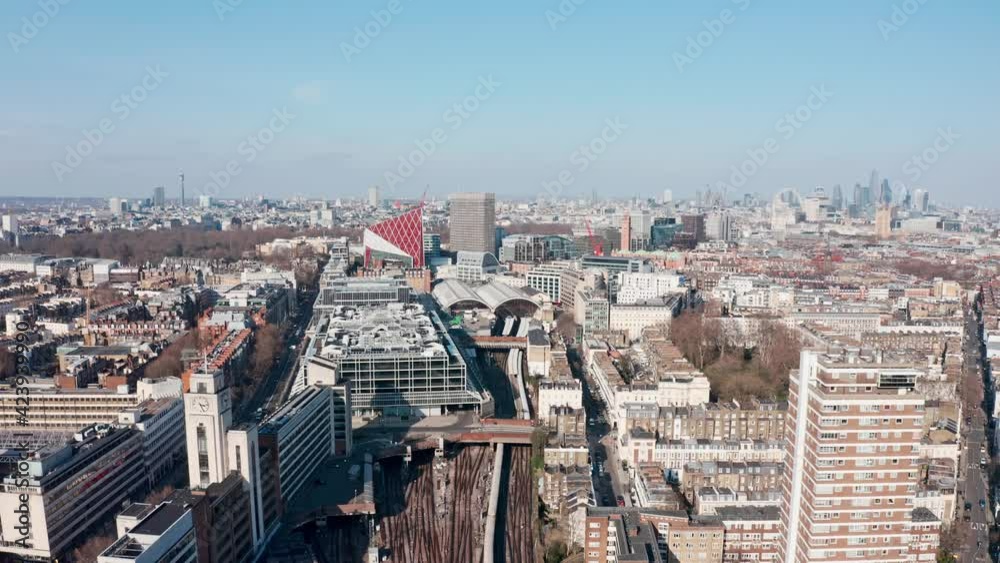 Aerial drone follow shot of Train entering London Victoria Railway station Aerial drone follow shot of Train entering London Victoria Railway station