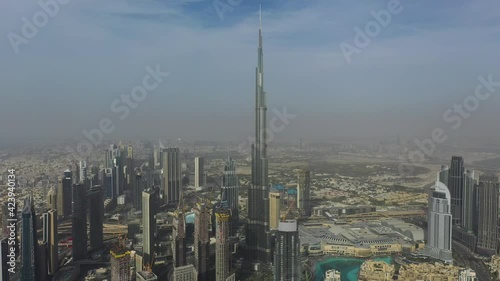 Aerial drone panning view of burj khalifa in Dubai, UAE photo