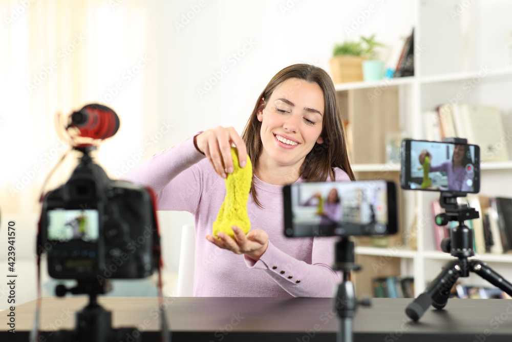 Fototapeta premium Influencer recording video with multiple devices.jpg