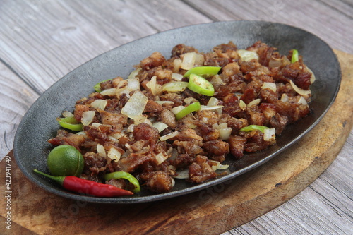 reshly cooked Filipino food called Pork Sisig