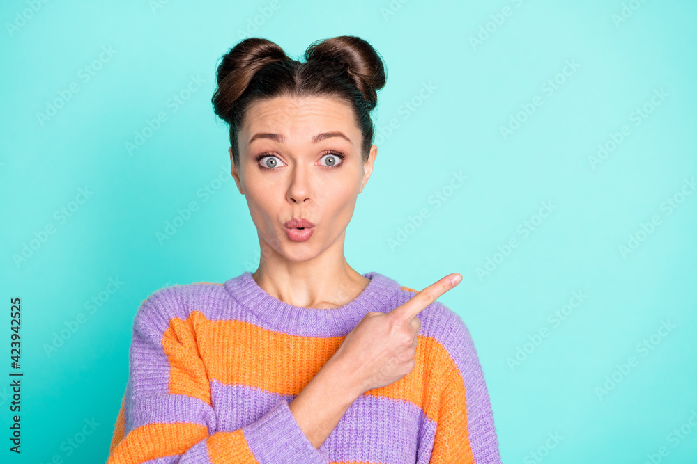 Portrait of impressed lady lips reaction confused direct finger empty space proposition isolated on blue color background Portrait of impressed lady lips reaction confused direct finger empty space proposition isolated on blue color background