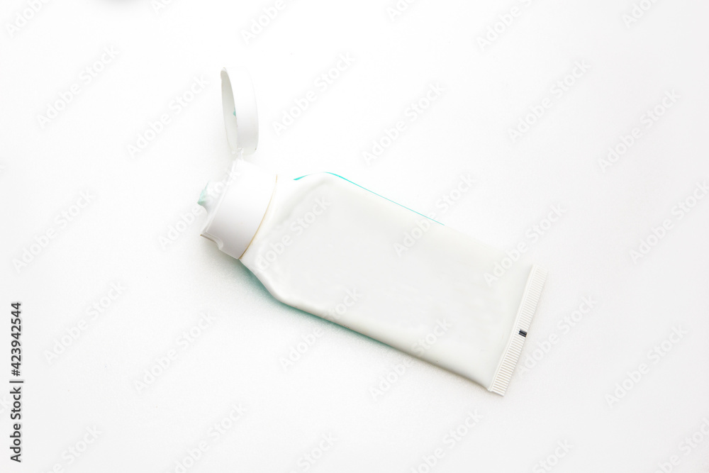 top view of used toothpaste on a white background top view of used toothpaste on a white background