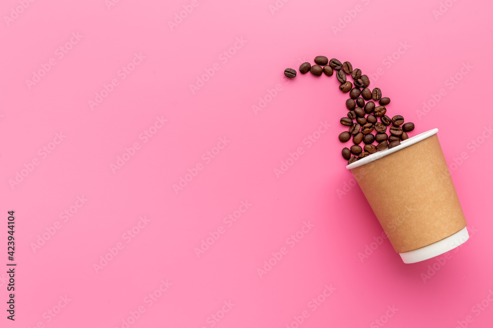 Paper cup with coffee beans. Coffee concept - obrazy, fototapety, plakaty 