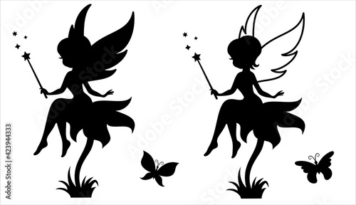 Silhouette of a fairy with a magic wand.