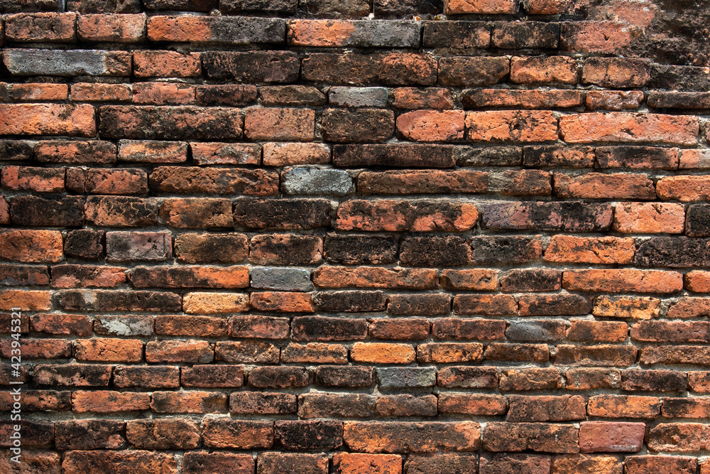 Vintage red brick wall. Old destroyed brick wall.