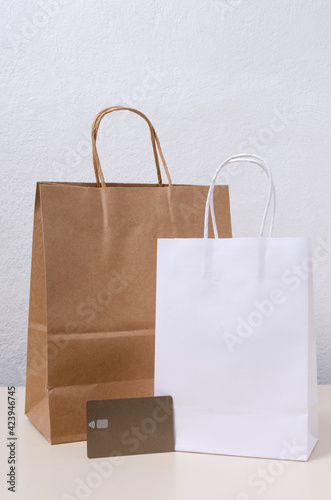 Vertical image of craft shopping bags and credit card
