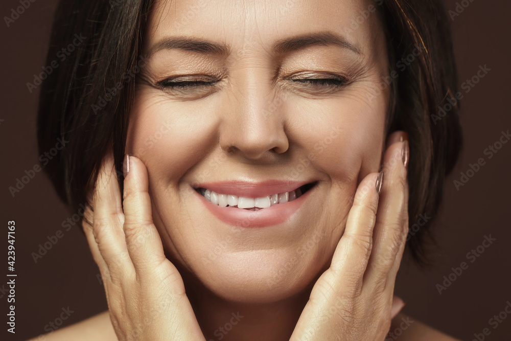 Beautiful middle aged woman with closed eyes Beautiful middle aged woman with closed eyes