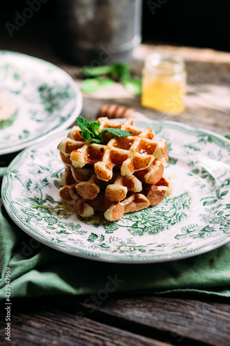 cottage cheese waffles with honey on a plate