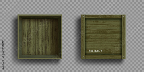 Empty open and closed green military wooden boxes.