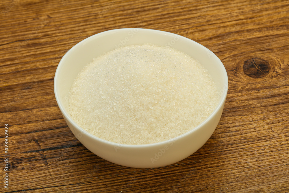 White sugar in the bowl White sugar in the bowl