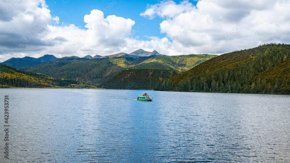 Shudu lake view with boat in Potatso national park Yunnan China