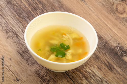 Tasty chicken soup with carrot