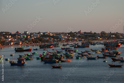 Wooden fishing boats in Mui Ne harbour, Vietnam.