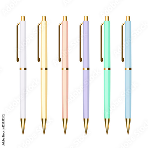 Set of pastel colored automatic ballpoint pens with golden buttons. Vector illustration