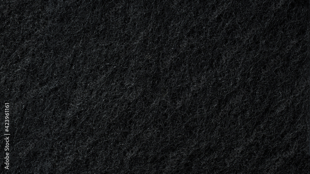 Fototapeta premium black sponge texture as background. abstract black background.