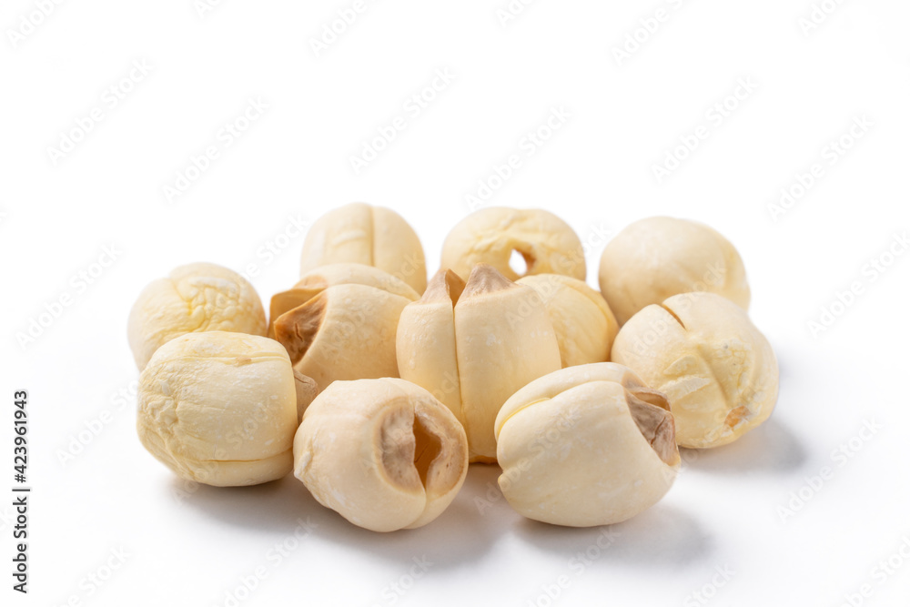 Close up of dried lotus seed isolated on white background