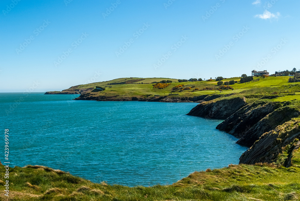 Stunning view of cliffy seascape,South Quay, Co. Wicklow, Ireland. Wicklow coastal line 	