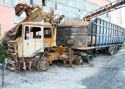 Burnt out cargo vehicle. The car after the fire.