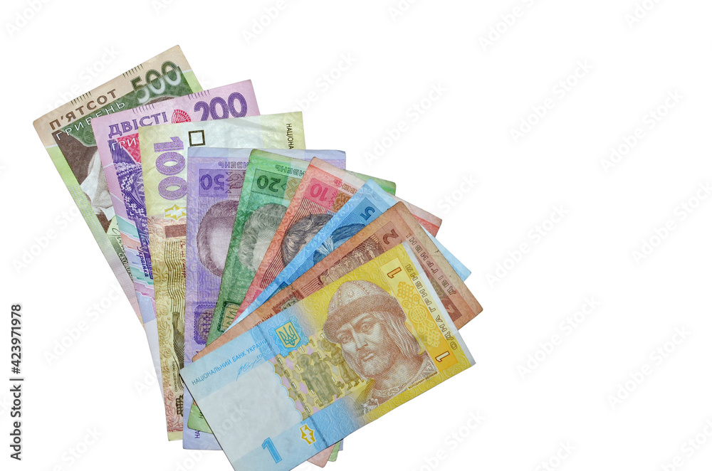 Fan of Ukrainian bills of all denominations - 1,2,5,10,20,50,100,200, 500 banknotes. Modern Ukrainian money - hryvnia isolated on white background. UAH. Free copy space. Business and finance concept Fan of Ukrainian bills of all denominations - 1,2,5,10,20,50,100,200, 500 banknotes. Modern Ukrainian money - hryvnia isolated on white background. UAH. Free copy space. Business and finance concept